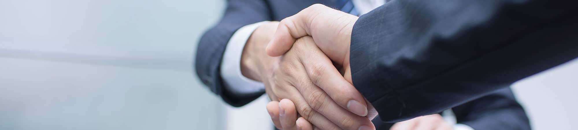 Business owners shaking hands