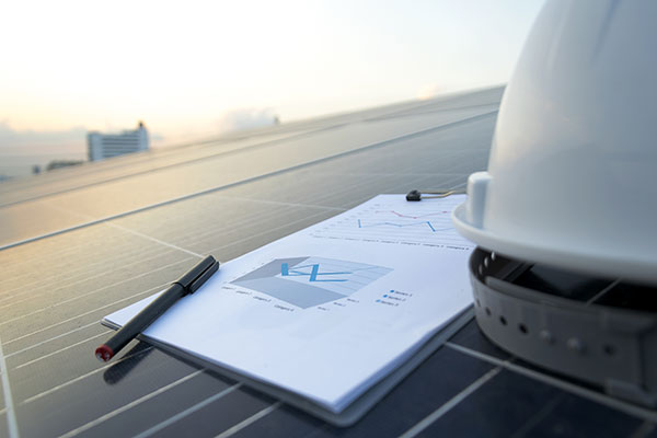 Hard hat and energy stats at Chester solar farm